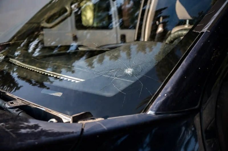 Rock chip in a windshield before repair