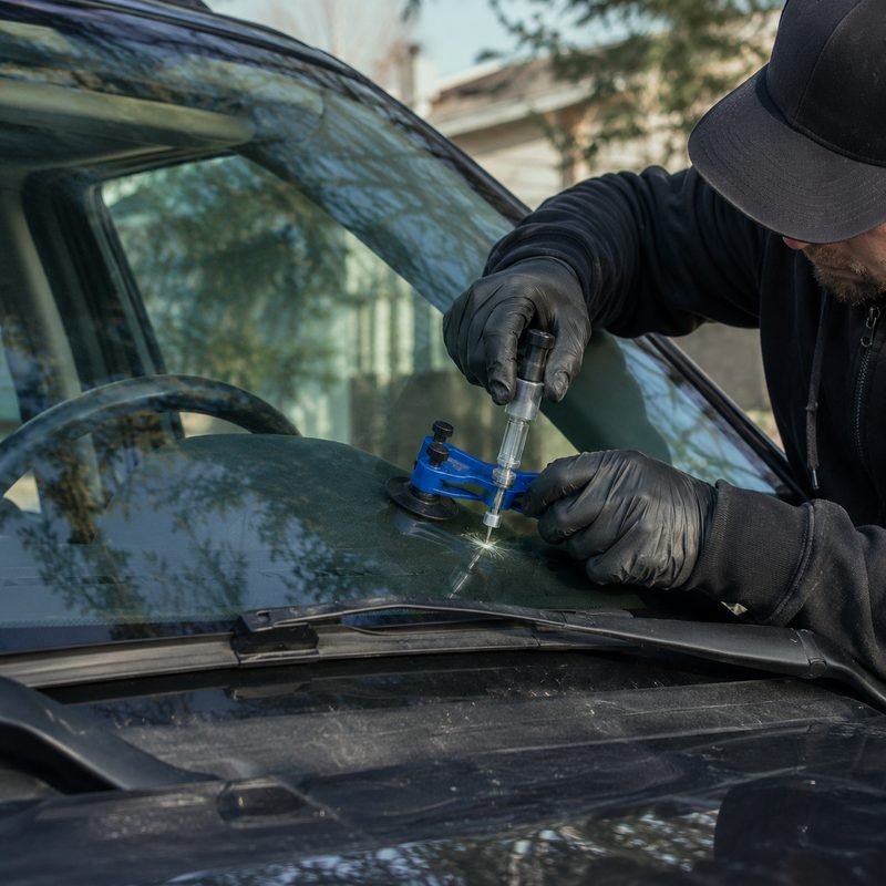 Filling a windshield chip with resin, mobile repair in Calgary