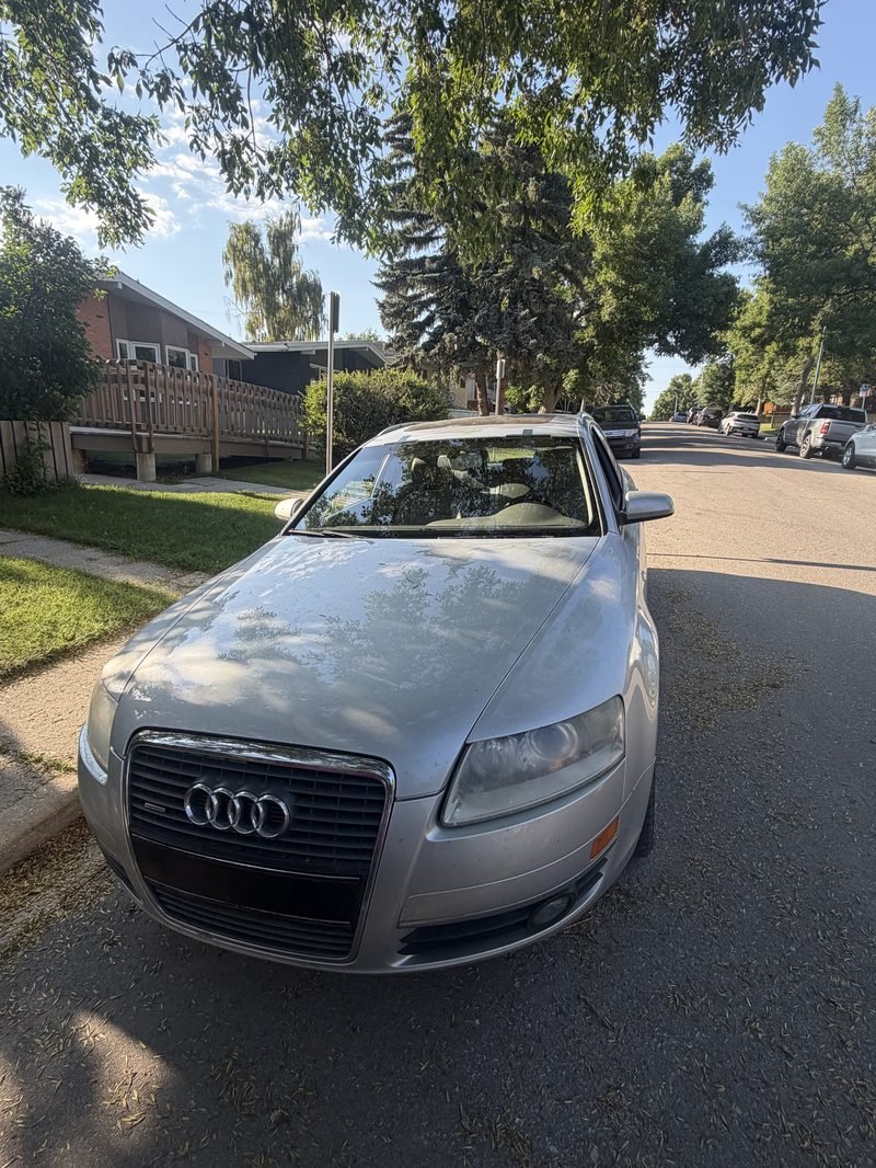 Audi A6. Evening job on a quiet street.