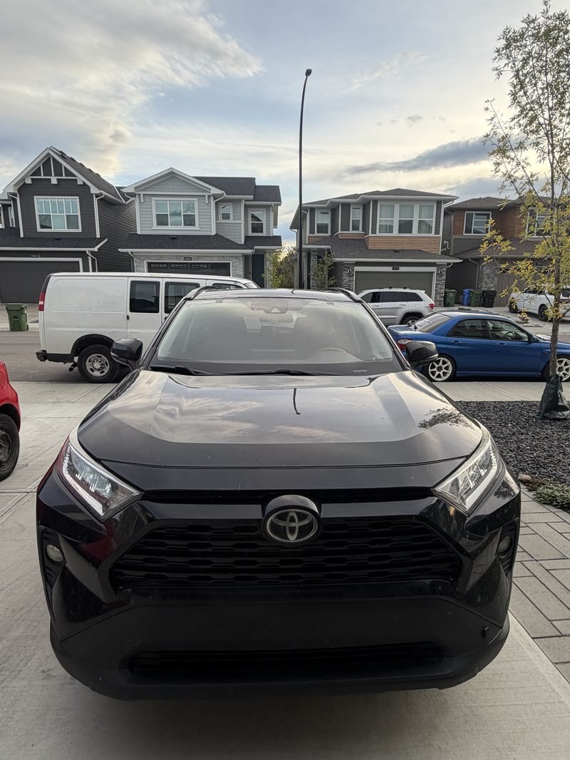 Toyota RAV4. Windshield replaced in the driveway.