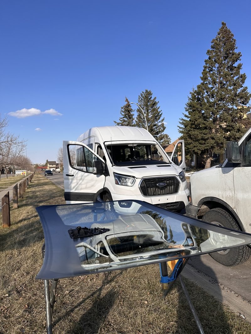 Ford Transit. Windshield swap in the yard.